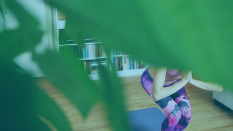 animation of four lines of colourful neon words stay at home over asian woman exercising