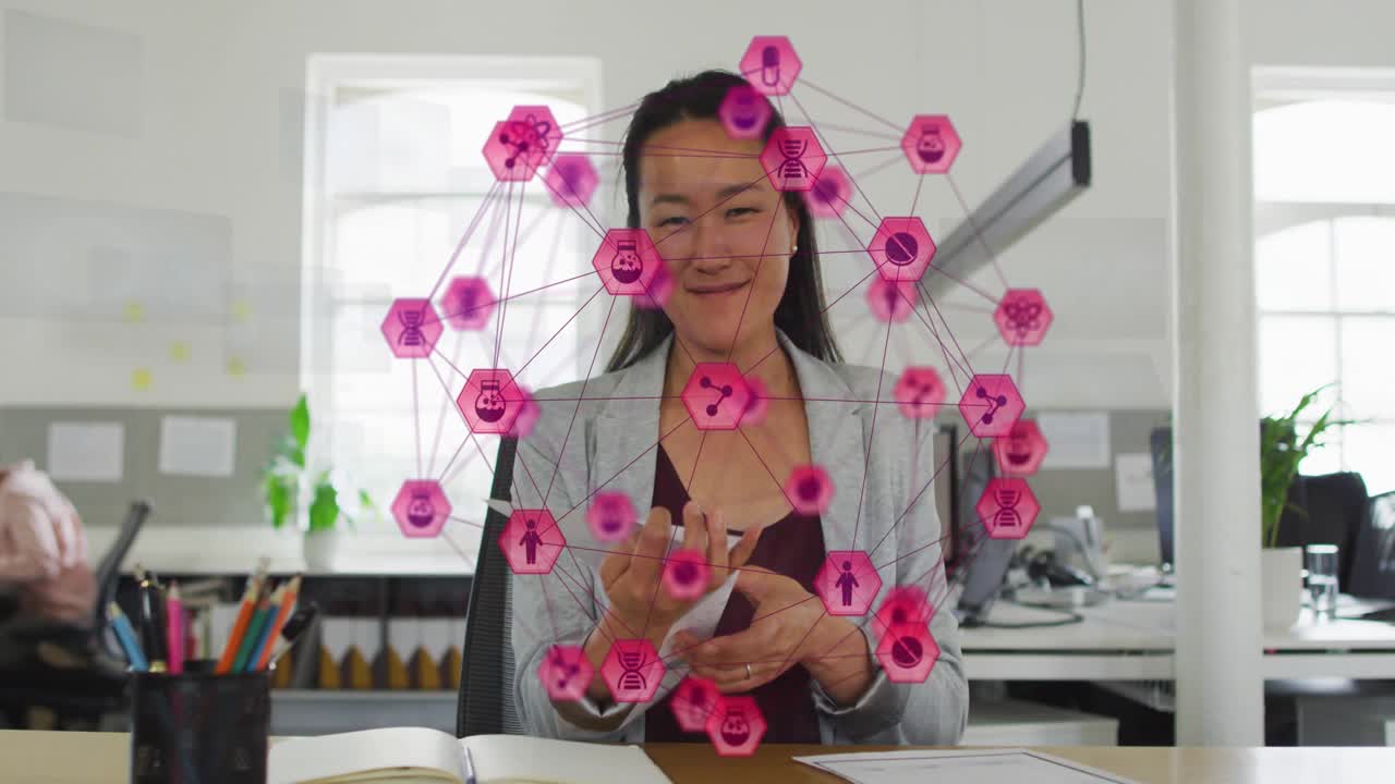 Businesswoman raising charts, revealing financial graphs using AR hexagon icons floating, gesturing