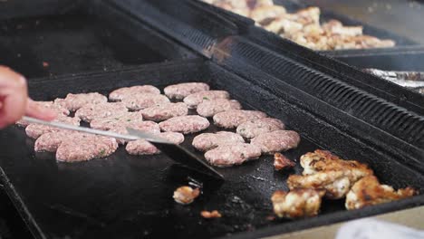 cooking turkish meatballs on a grill