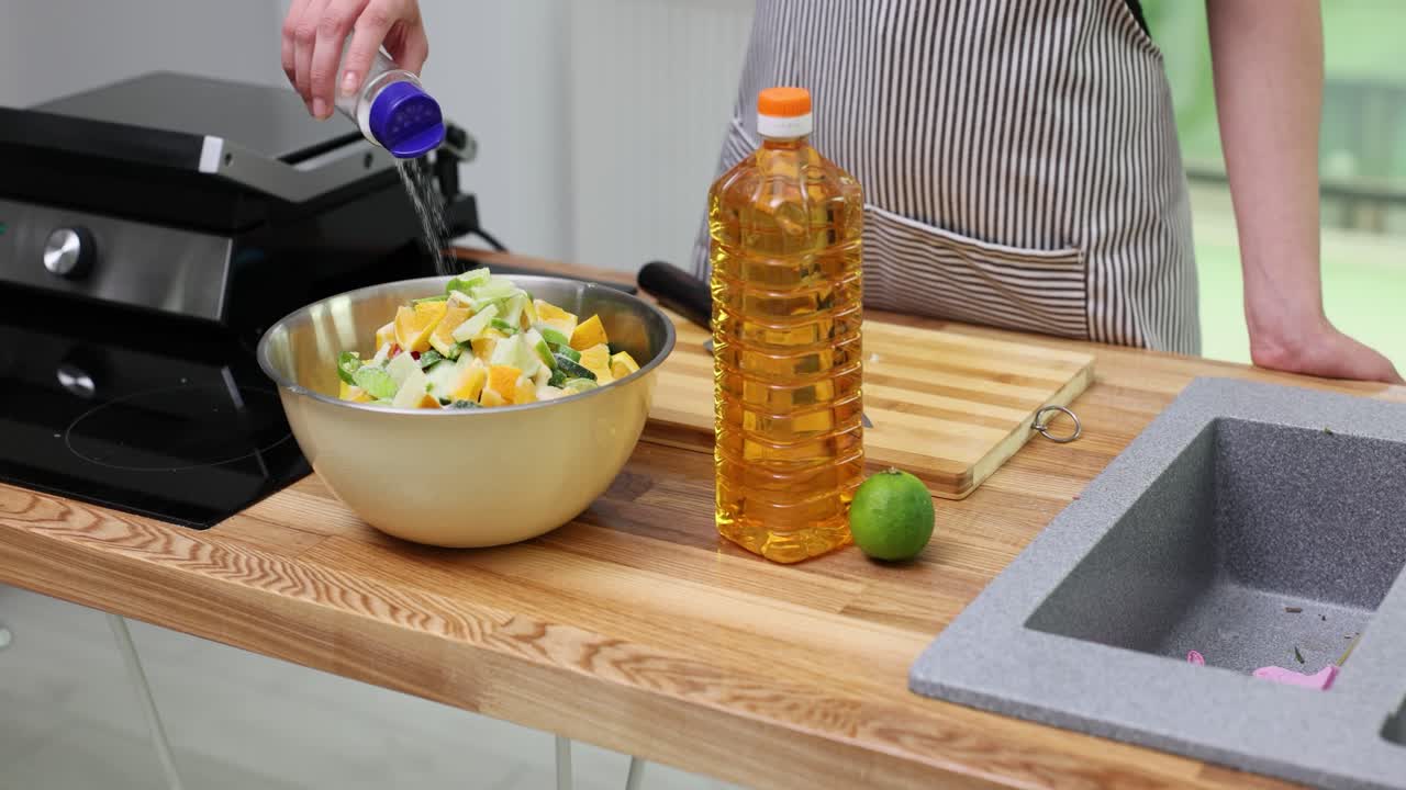 Preparing a Salad with Oil and Lime