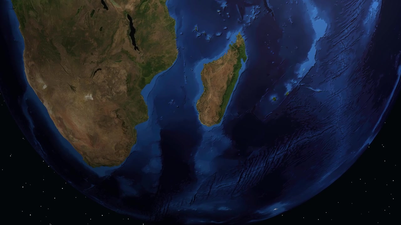 Digital globe rotates and zooms into Madagascar, displaying demographic information for the city Toliara