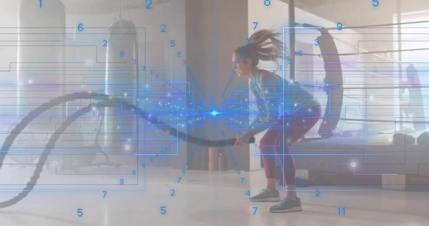 Female exerciser initiating battle rope waves while blue data overlay highlighting fitness metrics