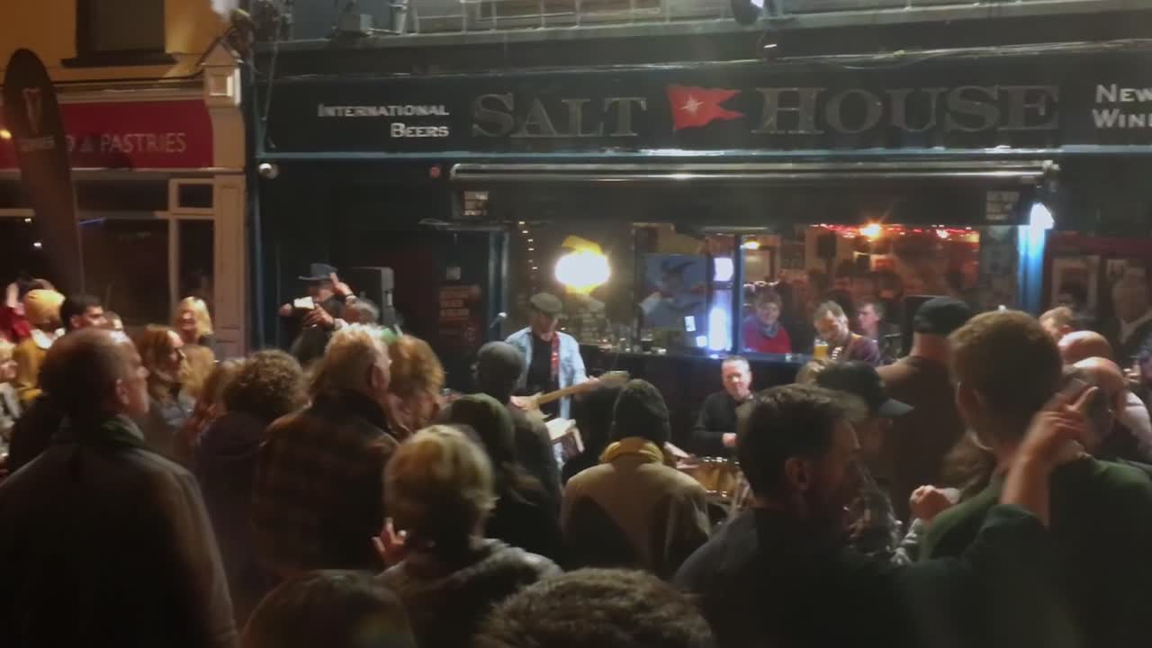 Saturday night rock street concert in Galway city with vibrant energy and live music. Ireland