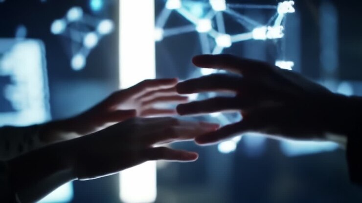 Exploring Interactivity: Two Hands Engaging with a Digital Interface Displaying Dynamic Data Connections in a Futuristic Environment