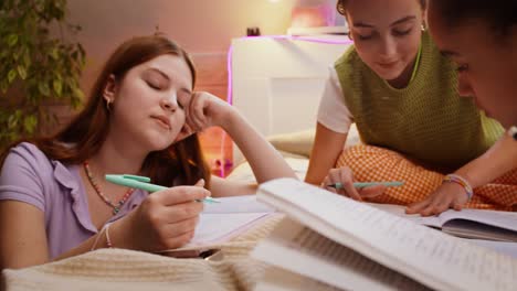 teenage girls studying together