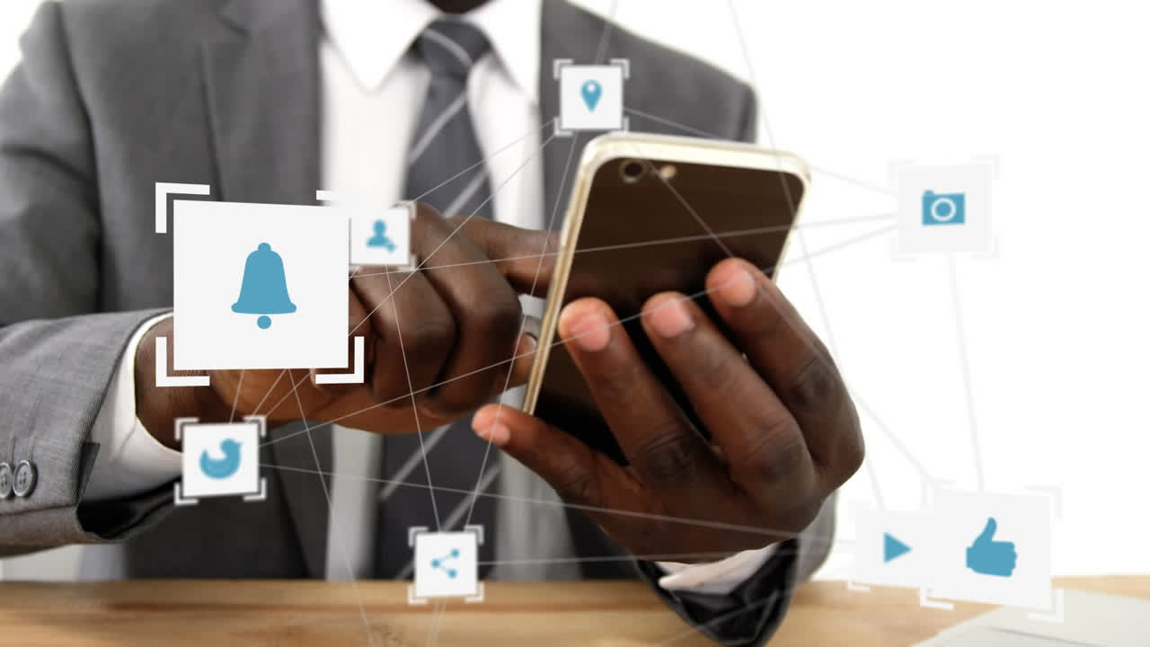 red de iconos de conexión contra la sección media del hombre que usa un teléfono inteligente en la oficina