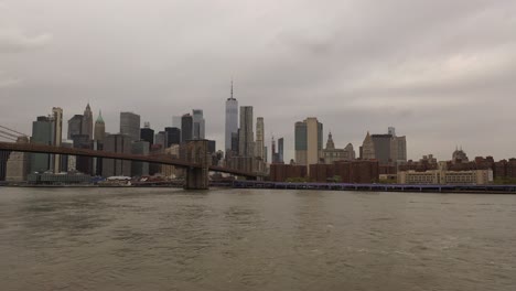 An-aerial-view-over-the-East-River-on-a-cloudy-day