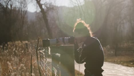 Female-Cinematographer-Filming-Trees-on-a-Hike