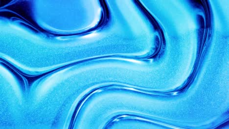 fondo líquido abstracto en bucle con patrón brillante ondulado en una superficie brillante y brillante. fluido azul viscoso como la superficie de papel de aluminio o vidrio brillante. hermoso telón de fondo festivo creativo. simple bg brillante