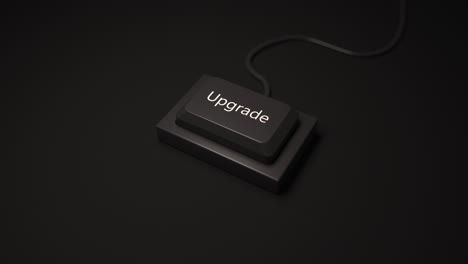 Minimalist button key with the inscription UPGRADE by pressing in black color.