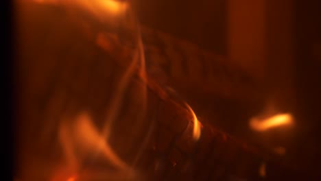 fireplace close up, burning flames, tilting uo, slow motion