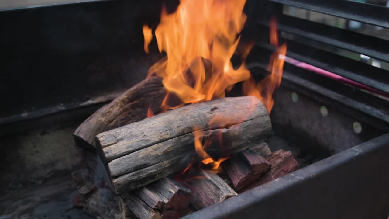 Wood burning in an outdoor fire