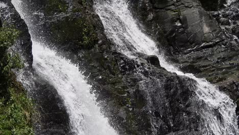 crocodile river waterfall flowing and falling over rocks at the walter sisulu national botanical gardens in roodepoort, south africa