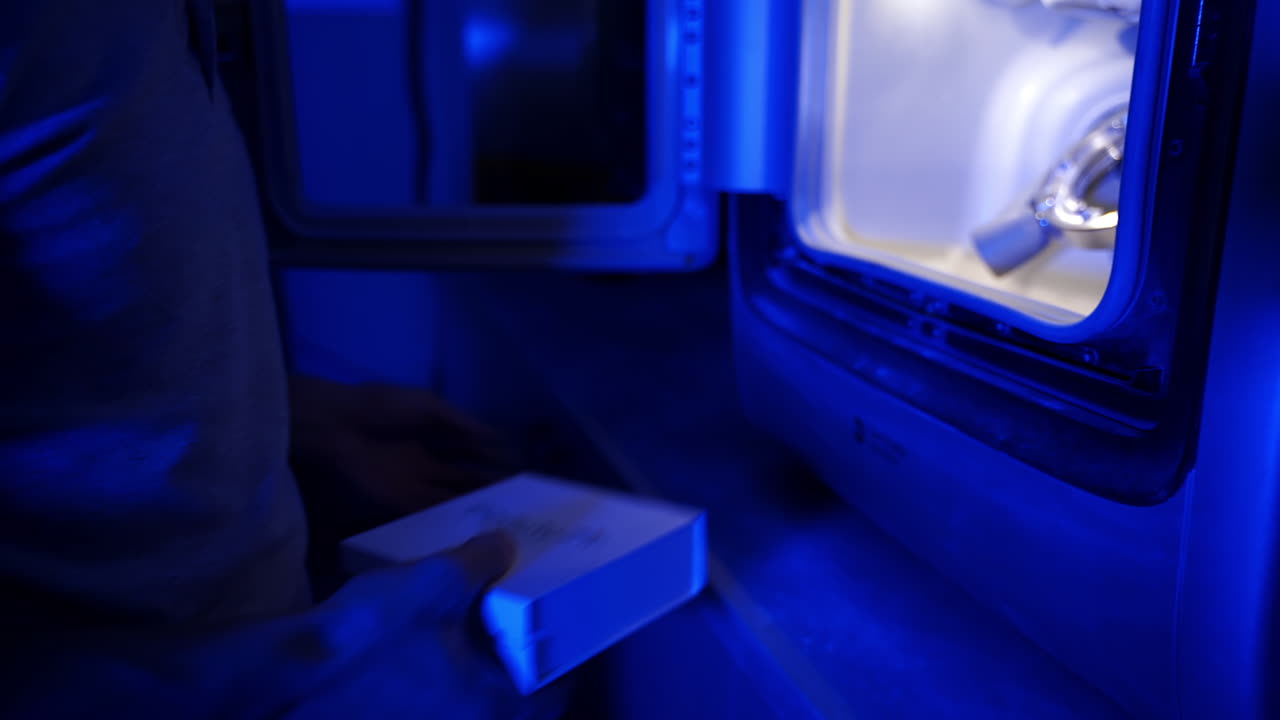 Making dental crowns at lab. Orthodontist making model of jaw on computer at lab