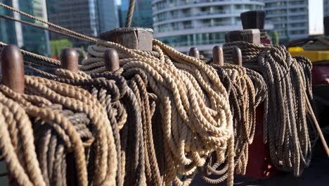 old wooden naval warship rigging rope