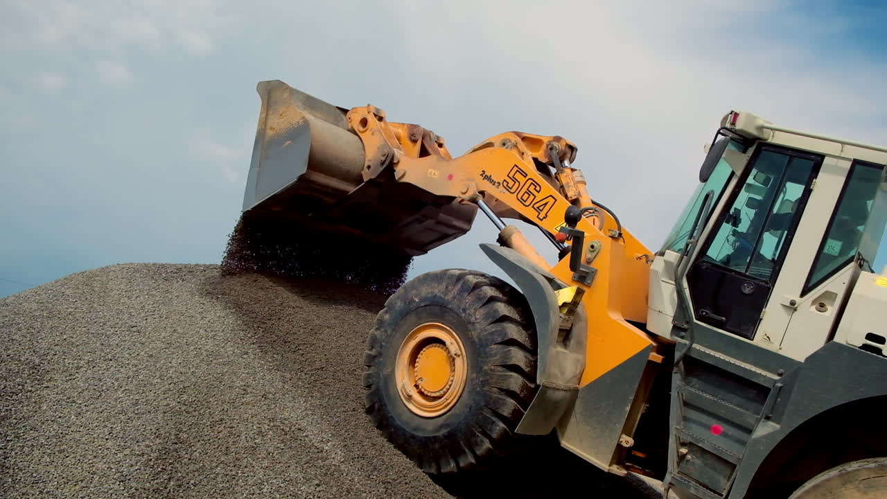Heavy excavator on quarry. Heavy duty machinery working on quarry