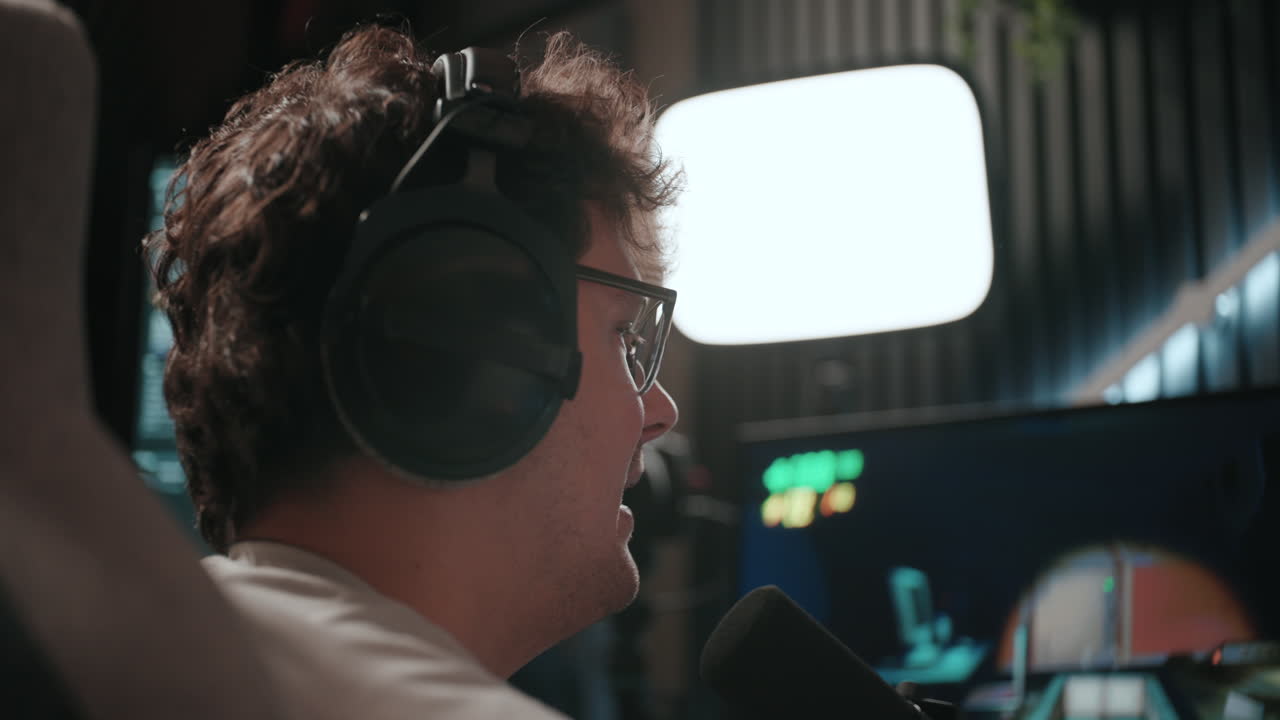 Gamer streaming or podcasting in a studio