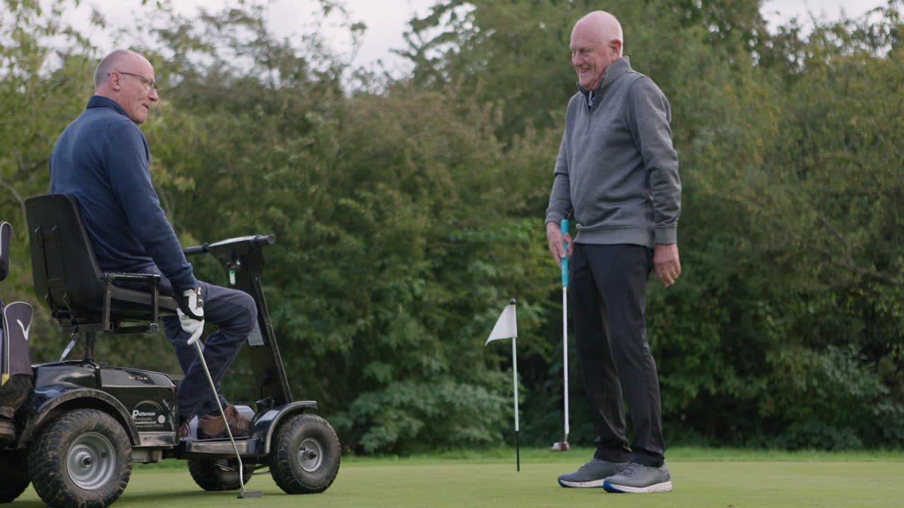 Two Elderly Men Playing Golf