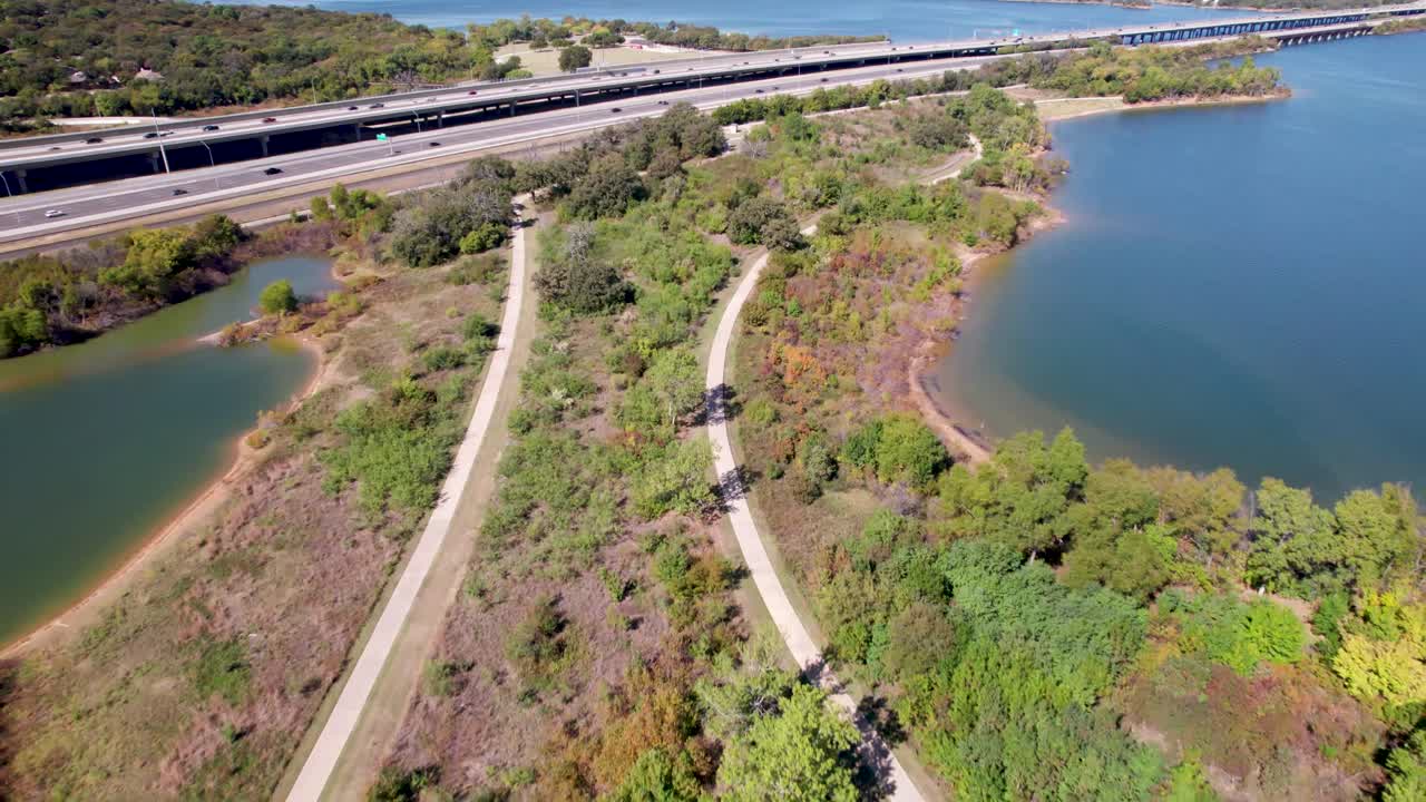 Aerial footage of the Copperas Branch Park walking trail on Lake Lewisville in Texas