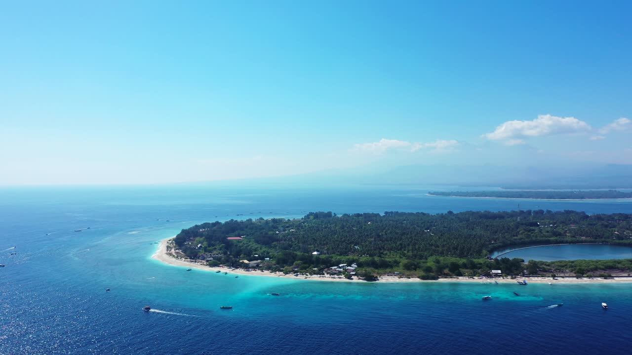 Gili Meno islands aerial seascape. Boat gliding in the calm turquoise sea water