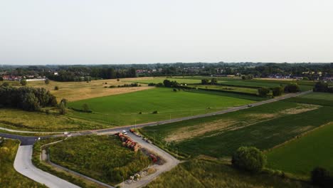 rural countryside of belgium with limburg in horizon, aerial view