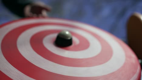 hypnotic spinning disk wooden object at kid playground