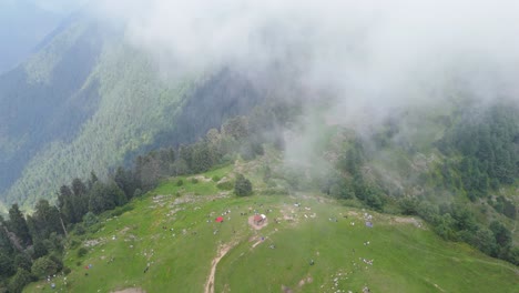 clouds engulfing mushkpuri top | breathtaking aerial view