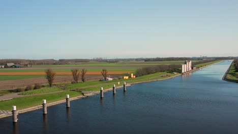 Aerial:-The-locks-of-the-Canal-through-Walcheren,-near-the-historical-town-Veere