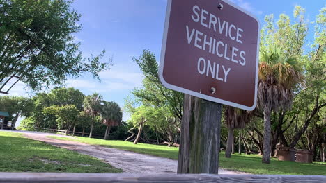 slow pan towards a sign warning visitors