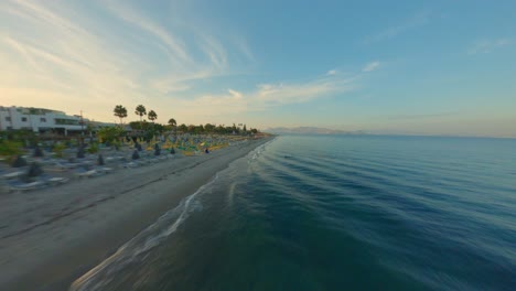 FPV---Flying-across-a-beach-in-Kos,-Greece