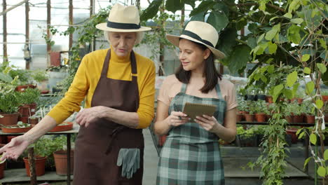 women in a greenhouse