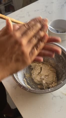 rolling vegan donut batter into small balls and adding to a plate to air fry