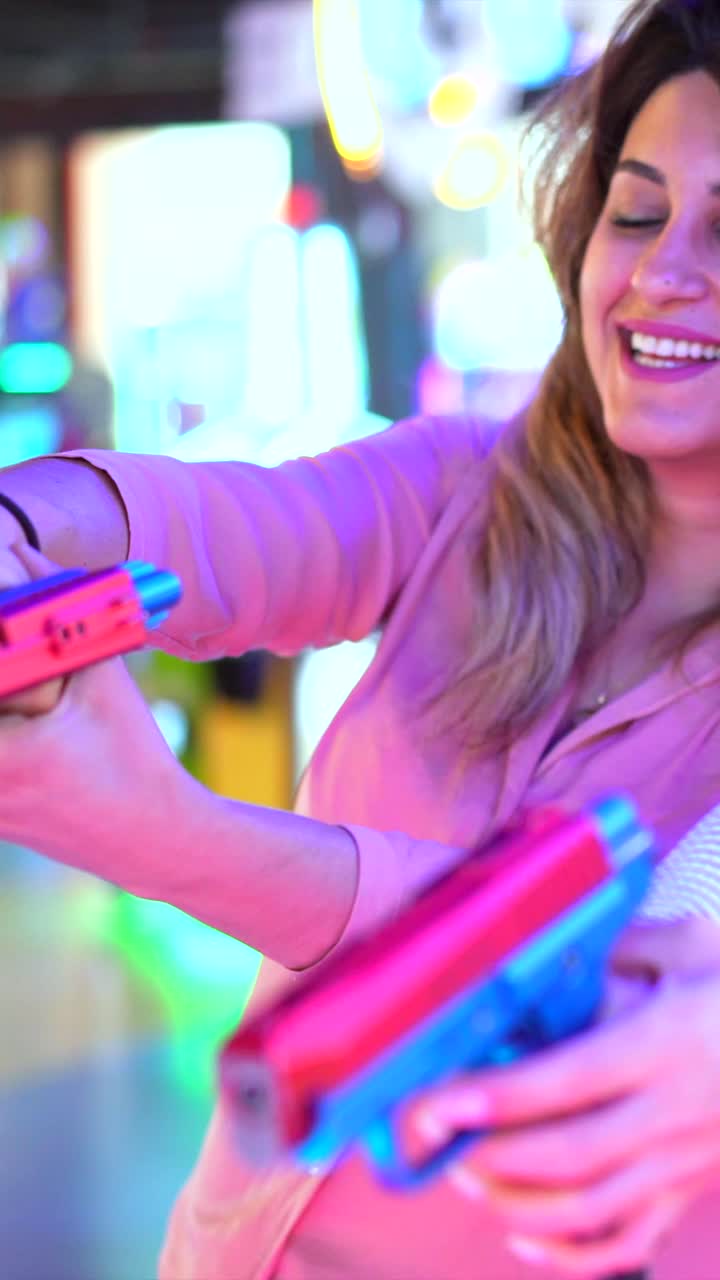 Women Playing Arcade Games