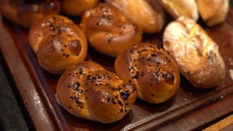 various varieties of soft, caramelized bread are on exhibit