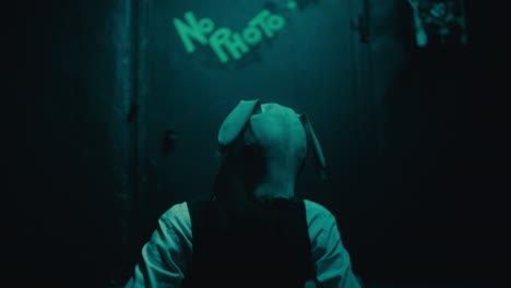 mysterious figure in dog mask