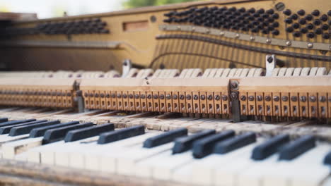 Old-Broken-Upright-Piano-Sitting-Outside-in-the-Open