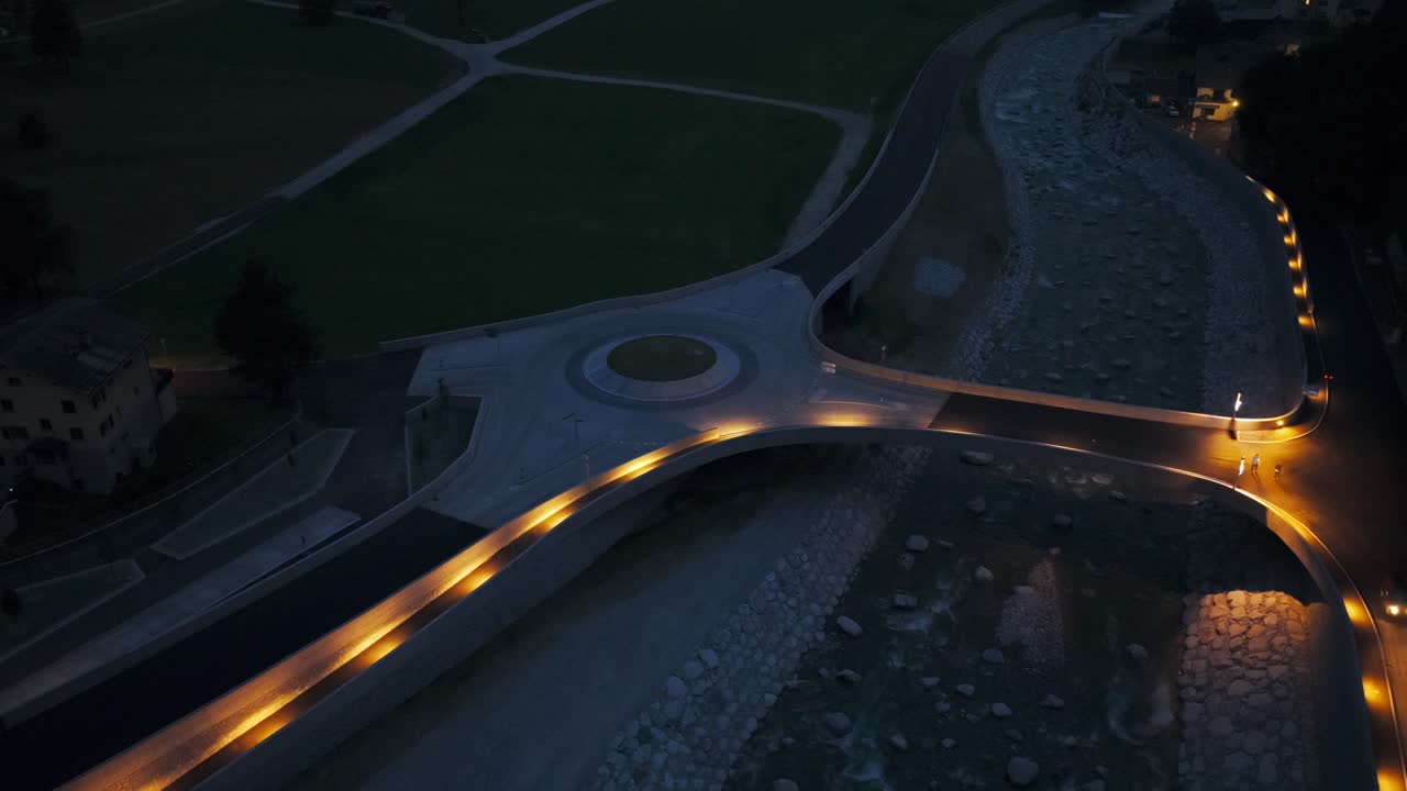 Aerial View Of Illuminated Roundabout Road Junction In Silvaplana, Switzerland