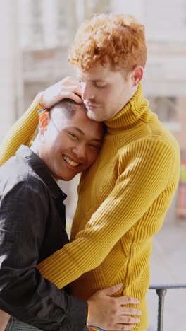 a loving embrace between two men