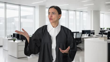 Serious-Indian-female-lawyer-talking