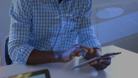 animation of infographic interface over african american man using digital tablet