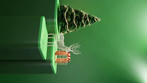 árbol de navidad, renos iluminados y regalo envuelto en fondo verde vertical