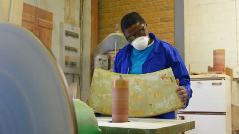 worker making mold in foundry workshop 4k