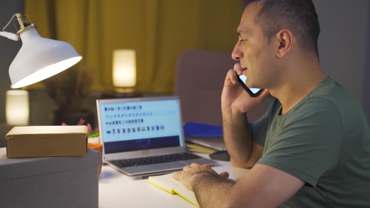E-commerce entrepreneur talking to his customer on the phone.