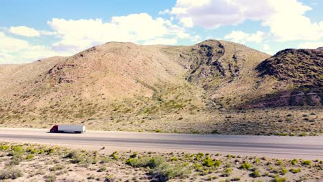 drone by desert road on a summer day