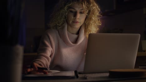 Handheld-video-of-woman-explaining-something-during-a-video-conference