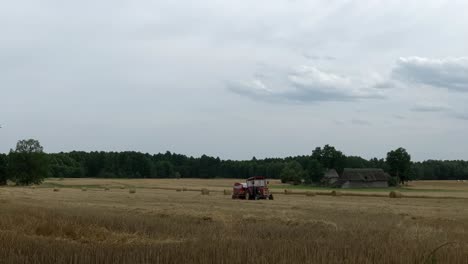time lapse of rye wheat harvesting with tractor working on field farm planation