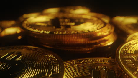 golden bitcoin cryptocurrency. rack focus shot