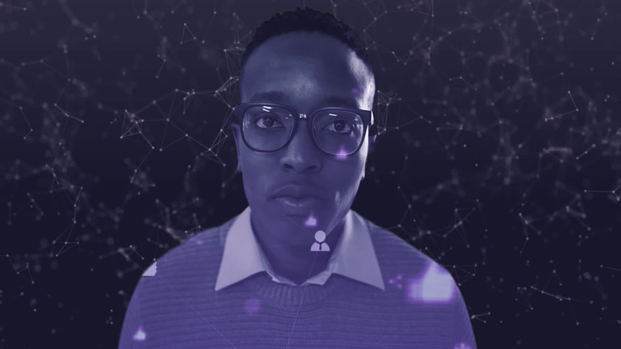 Digital icons and network of connections against man in glasses