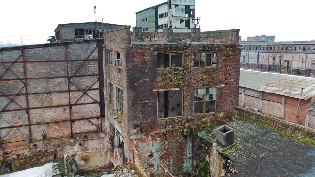 Abandoned industrial building. Ruins of an old factory. Aerial view