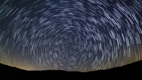 star trails over mountains